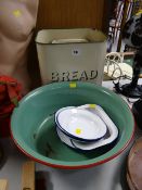A vintage enamel bread bin & enamel wash bowl