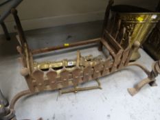 An iron fire basket & a pair of brass fire dogs etc