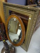 A vintage oval bevelled wall mirror & a good empty gilt picture frame