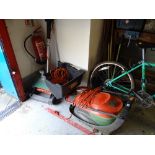 A Flymo Hover electric lawn mower together with a Black & Decker electric lawn racker E/T