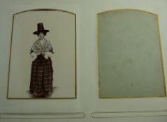 A FINE WELSH FAMILY PHOTOGRAPH ALBUM with metal clasp, full of family photographs and including a