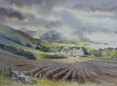 G WYN DAVIES watercolour - farmstead and The Rivals in the Llyn Peninsula, signed and dated 1991, 35