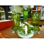 Mary Gregory style green glass decanter and stopper and a pair of green glass vases