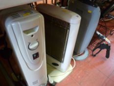 Two halogen heaters, one with remote control and an oil filled radiator E/T