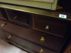 Stag Minstrel chest of drawers and a bedside cabinet