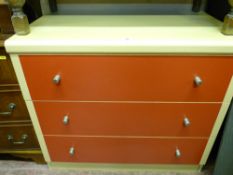 Modern light wood and red chest of three long drawers