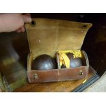 Old cased set of bowls, the case initialled 'W A'