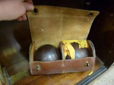 Old cased set of bowls, the case initialled 'W A'