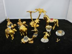 Quantity of yellow metal and glass delicate cabinet ornaments