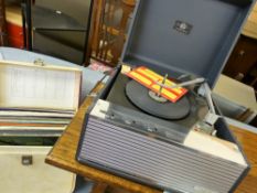 Dynatron 'Carnival' mains portable record player and a quantity of vinyl records in a vintage case
