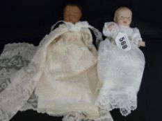 Two vintage dolls in christening gowns