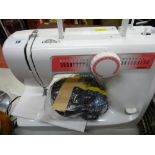 Modern Toyota electric sewing machine with pedal E/T