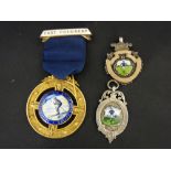 Three silver sporting medallions