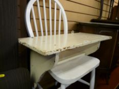 White painted Ercol chair and a hanging wall shelf