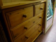 Modern pine chest of three long and two short drawers