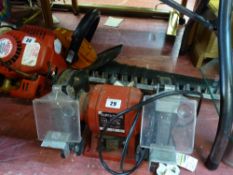 Workbench grinder and an electric hedge trimmer E/T