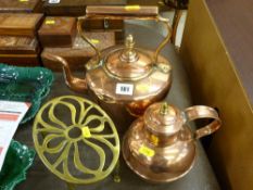 Brass kettle stand, copper kettle and a copper jug