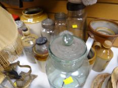 A collection of stoneware jars & bottles together with vintage glass jars