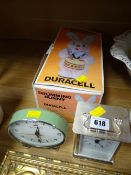 A retro alarm clock, reproduction carriage clock & a boxed Duracell 'Drumming Bunny'