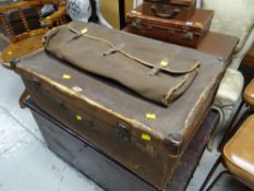 Vintage canvas suitcase together with squash racket in carry case