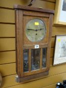 An early twentieth century brass dial & glazed wall clock