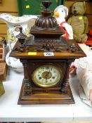 A late nineteenth century architectural mahogany mantel clock