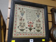 A super William IV framed child's needlework sampler with Biblical passage & stylized flowers,