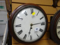 A circular dial wall clock with convex glass