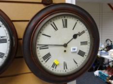 An antique circular dial wall clock