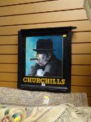 A painted pub sign featuring Winston Churchill for 'Churchills'