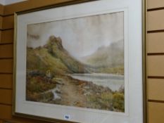Framed watercolour of a lake scene with misty mountains by ARTHUR SUKER, signed