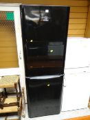 An Indesit upright fridge freezer in black E/T
