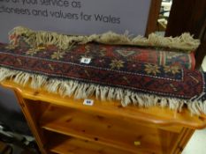 Two small patterned woollen Indian rugs