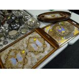 Three exotic butterfly winged trays together with an English Sheraton-style oval tray with plaque