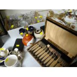 A box of glassware, four Oriental pottery items, cased cutlery & a vintage brass balance scales