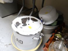 A parcel of enamel kitchen items together with a pottery mixing bowl