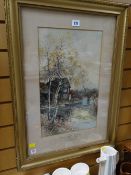 Framed watercolour by NORA HINCHLIFFE of a cottage on a river