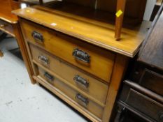 A vintage polished pine three-drawer chest base with Art Nouveau-style metal handles