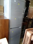 A Beko upright fridge freezer in silver E/T