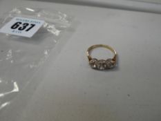 A 9ct yellow gold set three-stone diamond engagement ring, 2.1grms