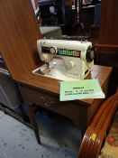 A New Home standing table electric sewing machine