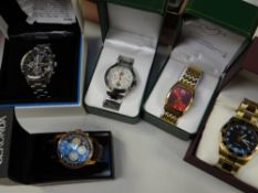 Five boxed modern gents 'chunky' wristwatches including two with Welsh dragon detail