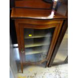 A nice Edwardian bow fronted glass door & inlaid music cabinet