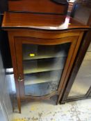 A nice Edwardian bow fronted glass door & inlaid music cabinet