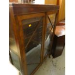 A vintage Deco-style two glass door dark wood display cabinet