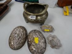 A polished bronze Chinese twin-handled censer, relief decorated with circling dragons together