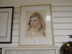 A framed pastel portrait of a young lady