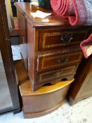 A small three-drawer inlaid decorated chest together with a wooden bow fronted lift top commode