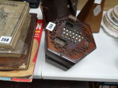 A turn of the century continental rosewood Lachenal & Co concertina