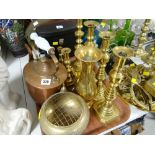 A pair of Queen of Diamonds-style brass candlestick holders, a pair of smaller similar, two